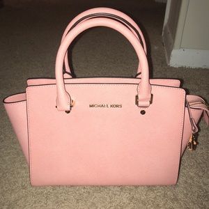 Pink Michael Kors purse with matching wallet